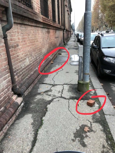Cittadino segnala calcinacci e buche in corso Borsalino